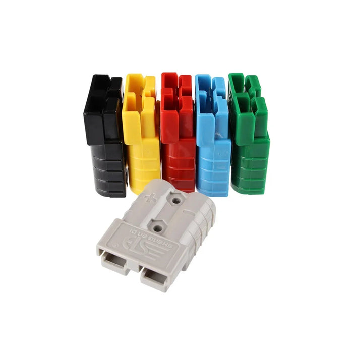 Assorted colored power connectors for battery and facility power parts on white background