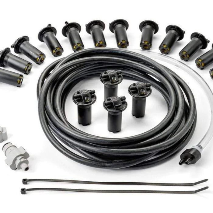 Battery watering system kit with tubing, valves, connectors, and water level indicators.