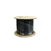 Black industrial charger cable spool on wood reel for facility power supply