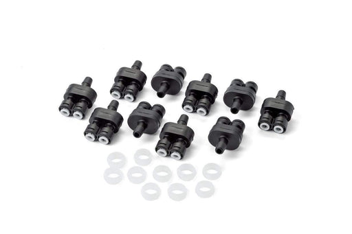 Set of black plastic input filters and white sealing rings for facility power systems